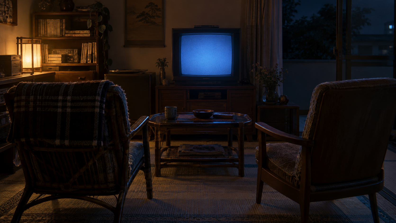 夜の部屋で空席がブラウン管の画面に向いている